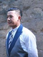 杜善起（呂行飾演）