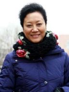 賈桂仙（王麗云飾演）